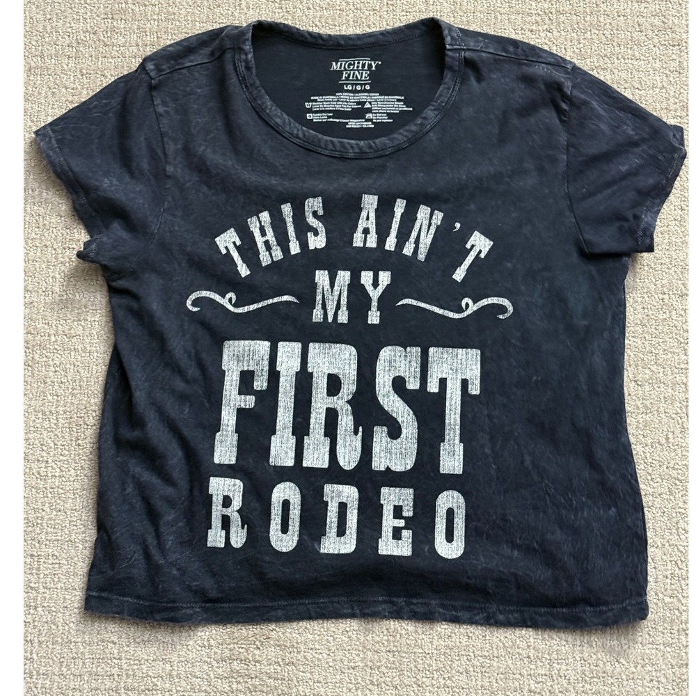 Mighty Fine Women's Black Graphic Tee - "This Ain't My First Rodeo"